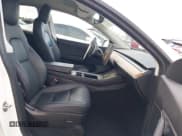 ✅ 2021 Tesla Model Y Long Range • VIN: 5YJYGAEE4MF214084 • Lot: 43758379. Listed on IAAI with 46,124 mi. Free auction sales archive from the USA and detailed vehicle history report at DreamBid. Image 5.