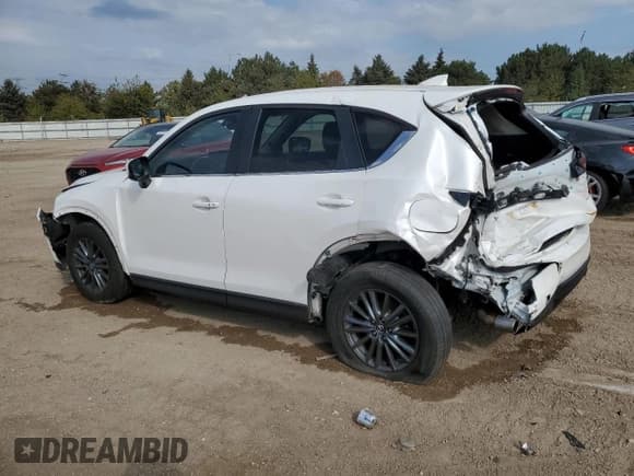 ✅ 2021 Mazda CX-5 Touring • VIN: JM3KFBCM9M1492438 • Lot: 86594165. Wystawiony na Copart z przebiegiem 94 049 mil. Bezpłatny archiwum sprzedaży aukcyjnych z USA i szczegółowy raport historii pojazdu na DreamBid. Zdjęcie 2.