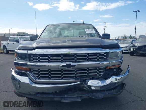 ✅ 2017 Chevrolet Silverado 1500 LT • VIN: 1GCRCREH1HZ158839 • Lot: 41257604. Listed on IAAI with 101,386 mi. Free auction sales archive from the USA and detailed vehicle history report at DreamBid. Image 12.