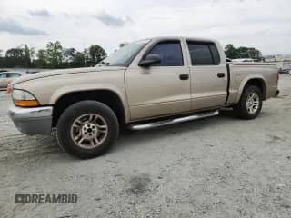 2003 Dodge Dakota SLT с VIN 1D7HL48N53S203580, выставлен на аукционе Copart как лот 70700295 с пробегом 135 973 миль миль и Чистый • Clean title. История ставок и продаж доступна на DreamBid. Изображение 1.