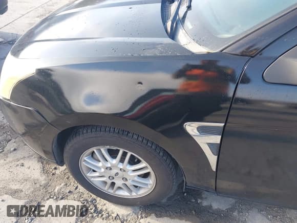 ✅ 2009 Ford Focus SE • VIN: 1FAHP35N19W112715 • Lot: 43898404. Wystawiony na IAAI z przebiegiem 126 910 mil. Bezpłatny archiwum sprzedaży aukcyjnych z USA i szczegółowy raport historii pojazdu na DreamBid. Zdjęcie 6.