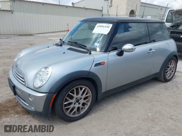✅ 2006 MINI Hardtop • VIN: WMWRC33546TJ75234 • Lot: 43091430. Listed on IAAI with 52,367 mi. Free auction sales archive from the USA and detailed vehicle history report at DreamBid. Image 2.