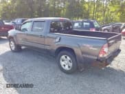 ✅ 2013 Toyota Tacoma • VIN: 3TMMU4FN3DM061944 • Lot: 42867859. Listed on IAAI with 183,857 mi. Free auction sales archive from the USA and detailed vehicle history report at DreamBid. Image 3.