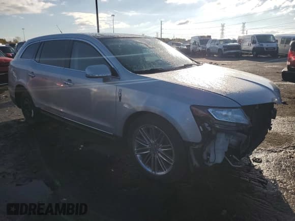 ✅ 2014 Lincoln MKT EcoBoost • VIN: 2LMHJ5AT2EBL58504 • Lot: 82540035. Listed on Copart with 130,317 mi. Free auction sales archive from the USA and detailed vehicle history report at DreamBid. Image 4.