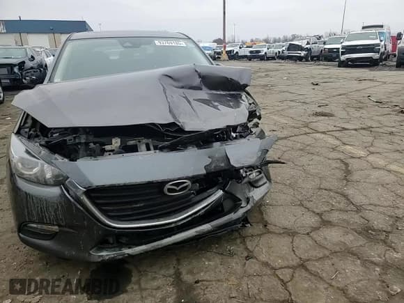 ✅ 2018 Mazda 3 Touring • VIN: 3MZBN1L39JM234381 • Lot: 93769185. Wystawiony na Copart z przebiegiem 76 810 mil. Bezpłatny archiwum sprzedaży aukcyjnych z USA i szczegółowy raport historii pojazdu na DreamBid. Zdjęcie 13.