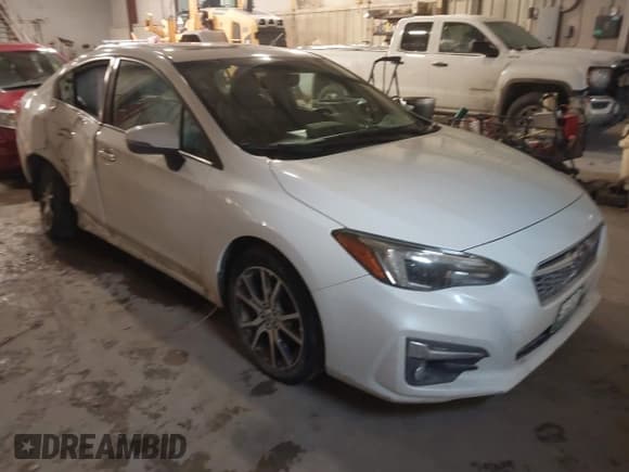✅ 2017 Subaru Impreza Limited • VIN: 4S3GKAU60H3605515 • Lot: 41390447. Listed on IAAI with 59,868 mi. Free auction sales archive from the USA and detailed vehicle history report at DreamBid. Image 1.