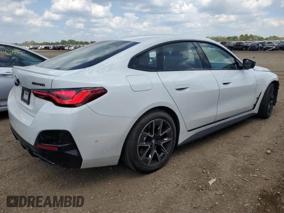 ✅ 2022 BMW 4 Series M440i xDrive • VIN: WBA13AW05NFN09933 • Lot: 63301375. Listed on Copart with 38,623 mi. Free auction sales archive from the USA and detailed vehicle history report at DreamBid. Image 3.