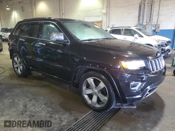 ✅ 2015 Jeep Grand Cherokee Overland • VIN: 1C4RJFCG8FC732562 • Lot: 46518865. Listed on Copart with 70,875 mi. Free auction sales archive from the USA and detailed vehicle history report at DreamBid. Image 4.