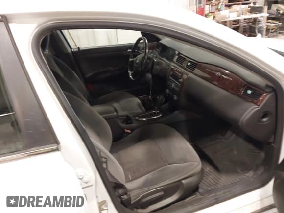 ✅ 2014 Chevrolet Impala LT • VIN: 2G1WB5E37E1139177 • Lot: 43544664. Listed on IAAI with 191,219 mi. Free auction sales archive from the USA and detailed vehicle history report at DreamBid. Image 5.