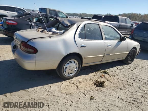 ✅ 1996 Nissan Altima XE • VIN: 1N4BU31D5TC104895 • Лот: 77043684. Опубликован ранее на Copart с пробегом 133 113 миль. Бесплатный доступ к архиву аукционных продаж из США и подробный отчёт об истории автомобиля на DreamBid. Изображение 3.