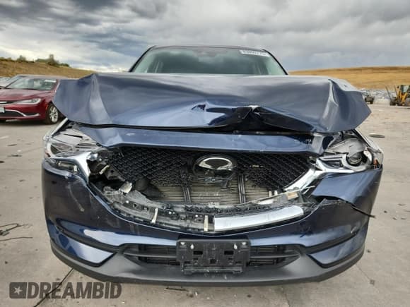 ✅ 2020 Mazda CX-5 Grand Touring Reserve • VIN: JM3KFBAY3L0835397 • Lot: 83859775. Listed on Copart with 29,679 mi. Free auction sales archive from the USA and detailed vehicle history report at DreamBid. Image 5.