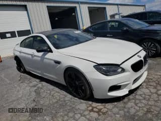 ✅ 2015 BMW M6 • VIN: WBS6C9C52FD467752 • Lot: 67884554. Wystawiony na Copart z przebiegiem 60 729 mil. Bezpłatny archiwum sprzedaży aukcyjnych z USA i szczegółowy raport historii pojazdu na DreamBid. Zdjęcie 4.
