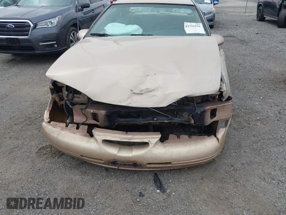 ✅ 1996 Ford Thunderbird LX • VIN: 1FALP62W5TH100233 • Lot: 42322331. Listed on IAAI with 36,976 mi. Free auction sales archive from the USA and detailed vehicle history report at DreamBid. Image 6.