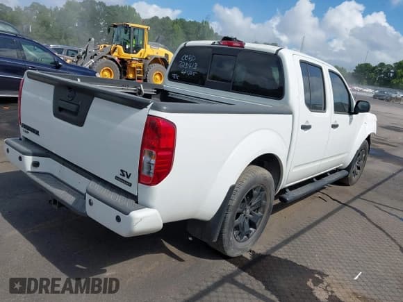 ✅ 2021 Nissan Frontier SV • VIN: 1N6ED0EA9MN723413 • Lot: 42730072. Listed on IAAI with 63,182 mi. Free auction sales archive from the USA and detailed vehicle history report at DreamBid. Image 4.