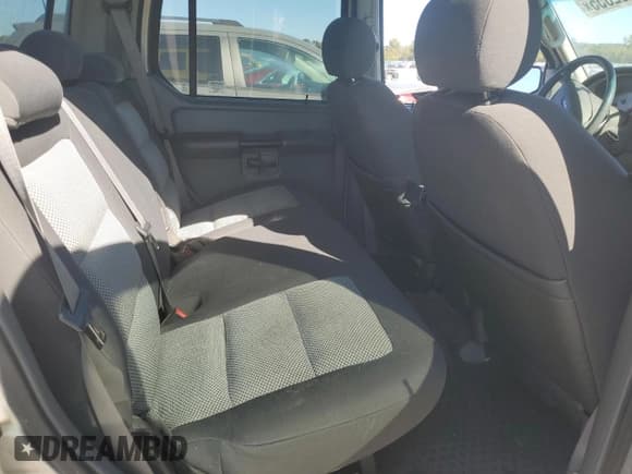 ✅ 2005 Ford Explorer Sport Trac XLS • VIN: 1FMZU67K15UB68988 • Лот: 89802355. Опубликован ранее на Copart с пробегом 112 521 миль. Бесплатный доступ к архиву аукционных продаж из США и подробный отчёт об истории автомобиля на DreamBid. Изображение 10.