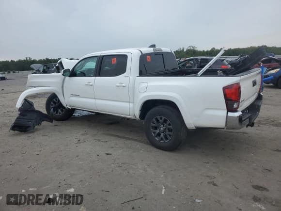 ✅ 2023 Toyota Tacoma SR • VIN: 3TMCZ5ANXPM567978 • Lot: 81085825. Listed on Copart with 34,463 mi. Free auction sales archive from the USA and detailed vehicle history report at DreamBid. Image 2.