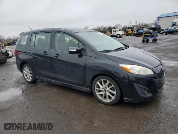 ✅ 2015 Mazda 5 Grand Touring • VIN: JM1CW2DL4F0187845 • Лот: 51895575. Опубликован ранее на Copart с пробегом 133 464 миль. Бесплатный доступ к архиву аукционных продаж из США и подробный отчёт об истории автомобиля на DreamBid. Изображение 4.