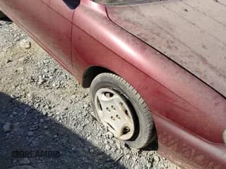 ✅ 2001 Kia Sephia • VIN: KNAFB121715045535 • Lot: 41765390. Wystawiony na IAAI z przebiegiem 128 815 mil. Bezpłatny archiwum sprzedaży aukcyjnych z USA i szczegółowy raport historii pojazdu na DreamBid. Zdjęcie 6.