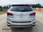 ✅ 2017 Hyundai Santa Fe 2.4L • VIN: 5XYZU3LB9HG430643 • Lot: 91221195. Wystawiony na Copart z przebiegiem 80 521 mil. Bezpłatny archiwum sprzedaży aukcyjnych z USA i szczegółowy raport historii pojazdu na DreamBid. Zdjęcie 6.
