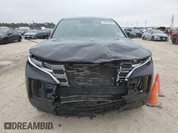 2024 Hyundai Santa Cruz SEL с VIN 5NTJBDAE2RH083660, выставлен на аукционе Copart как лот 44815465 с пробегом Не указан миль и Списание • Salvage title. История ставок и продаж доступна на DreamBid. Изображение 5.