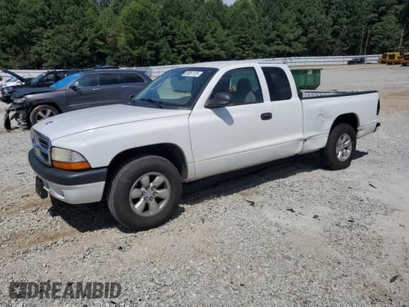 2004 Dodge Dakota Sport z VIN 1D7GL32K44S639553, wystawiony jako Copart lot #69651125 z przebiegiem 197 676 mil mil oraz Szkoda całkowita • Salvage title. Historia ofert i sprzedaży dostępna na DreamBid. Obrazek 1.
