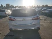 ✅ 2018 Chevrolet Equinox Premier • VIN: 2GNAXMEV7J6300226 • Lot: 92163775. Listed on Copart with 147,562 mi. Free auction sales archive from the USA and detailed vehicle history report at DreamBid. Image 6.