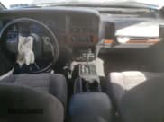 ✅ 1997 Jeep Grand Cherokee Laredo • VIN: 1J4GZ58S5VC688455 • Лот: 74294204. Опубликован ранее на Copart с пробегом 135 143 миль. Бесплатный доступ к архиву аукционных продаж из США и подробный отчёт об истории автомобиля на DreamBid. Изображение 8.