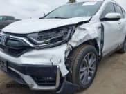 ✅ 2022 Honda CR-V Touring • VIN: 5J6RT6H95NL043897 • Lot: 43316993. Listed on IAAI with 154,584 mi. Free auction sales archive from the USA and detailed vehicle history report at DreamBid. Image 6.