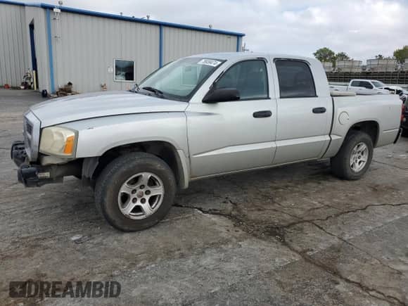 2006 Dodge Dakota ST z VIN 1D7HE28K76S641283, wystawiony jako Copart lot #78939474 z przebiegiem 229 561 mil mil oraz Szkoda całkowita • Salvage title. Historia ofert i sprzedaży dostępna na DreamBid. Obrazek 1.