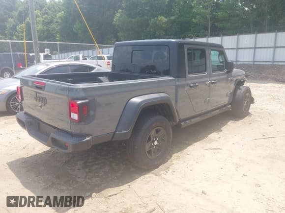 ✅ 2023 Jeep Gladiator Sport S • VIN: 1C6HJTAG7PL522721 • Лот: 42594463. Опубликован ранее на IAAI с пробегом 64 702 миль. Бесплатный доступ к архиву аукционных продаж из США и подробный отчёт об истории автомобиля на DreamBid. Изображение 4.