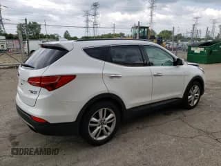 ✅ 2015 Hyundai Santa Fe • VIN: 5XYZWDLA6FG266272 • Лот: 64090093. Опубликован ранее на Copart с пробегом 75 353 миль. Бесплатный доступ к архиву аукционных продаж из США и подробный отчёт об истории автомобиля на DreamBid. Изображение 3.