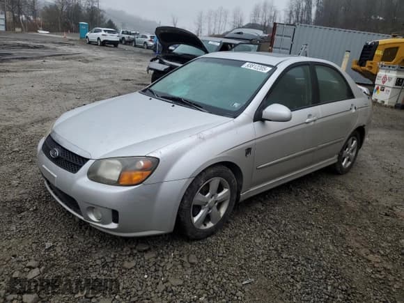 ✅ 2009 Kia Spectra EX • VIN: KNAFE222795027263 • Lot: 93812205. Listed on Copart with 164,002 mi. Free auction sales archive from the USA and detailed vehicle history report at DreamBid. Image 1.