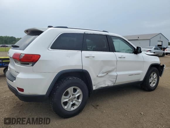 ✅ 2015 Jeep Grand Cherokee Laredo • VIN: 1C4RJFAG1FC948319 • Lot: 65027505. Listed on Copart with 97,218 mi. Free auction sales archive from the USA and detailed vehicle history report at DreamBid. Image 3.