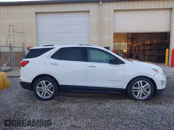 2020 Chevrolet Equinox Premier with VIN 3GNAXPEX7LS719569, listed as a IAAI auction lot 43479451 with 36,680 mi miles and . Bid and sale history available at DreamBid. Image 13.