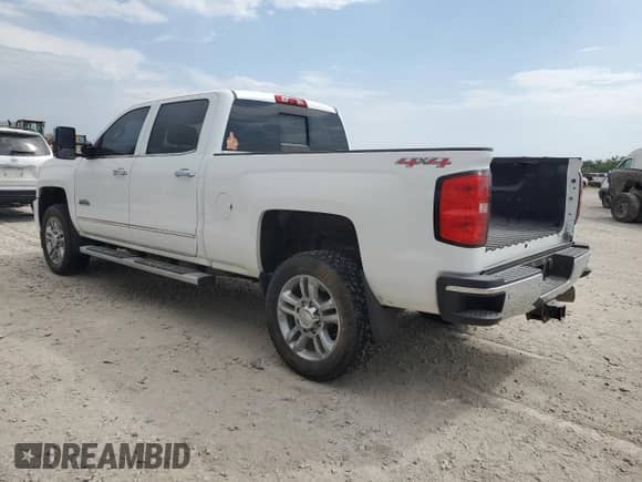 2015 Chevrolet Silverado 2500HD High Country с VIN 1GC1KXE87FF631517, выставлен на аукционе Copart как лот 68724835 с пробегом 128 771 миль миль и Списание • Salvage title. История ставок и продаж доступна на DreamBid. Изображение 2.