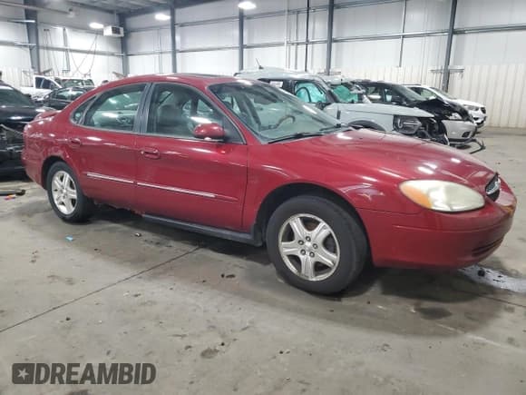 ✅ 2002 Ford Taurus SEL Deluxe • VIN: 1FAHP56S32G233519 • Lot: 59051105. Listed on Copart with 127,524 mi. Free auction sales archive from the USA and detailed vehicle history report at DreamBid. Image 4.