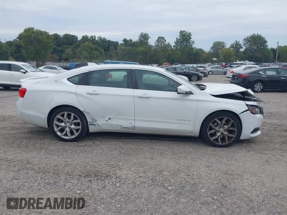 ✅ 2015 Chevrolet Impala LT • VIN: 2G1125S37F9137222 • Lot: 43332544. Listed on IAAI with 137,600 mi. Free auction sales archive from the USA and detailed vehicle history report at DreamBid. Image 13.