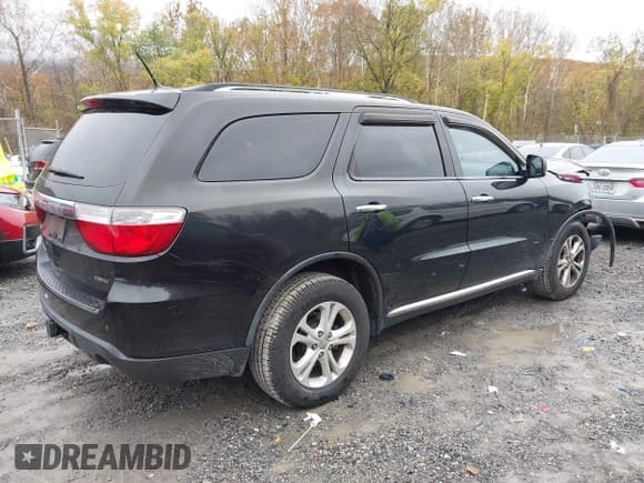 ✅ 2013 Dodge Durango Crew • VIN: 1C4RDJDG2DC530631 • Lot: 43540833. Listed on IAAI with 194,649 mi. Free auction sales archive from the USA and detailed vehicle history report at DreamBid. Image 4.