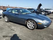 ✅ 2000 Jaguar XK • VIN: SAJJA41C3YNA03723 • Lot: 85399885. Listed on Copart with 123,527 mi. Free auction sales archive from the USA and detailed vehicle history report at DreamBid. Image 4.