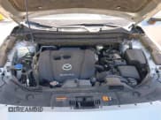 ✅ 2022 Mazda CX-5 S Carbon Edition • VIN: JM3KFBCM2N1582998 • Lot: 43316644. Wystawiony na IAAI z przebiegiem 85 217 mil. Bezpłatny archiwum sprzedaży aukcyjnych z USA i szczegółowy raport historii pojazdu na DreamBid. Zdjęcie 10.