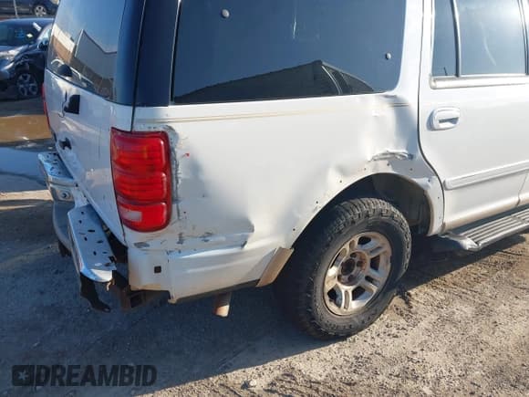✅ 1999 Ford Expedition XLT • VIN: 1FMRU1761XLA56030 • Lot: 42703533. Listed on IAAI with Not provided. Free auction sales archive from the USA and detailed vehicle history report at DreamBid. Image 13.