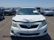 ✅ 2010 Toyota Corolla • VIN: JTDBU4EE7A9104121 • Lot: 42956469. Listed on IAAI with 148,808 mi. Free auction sales archive from the USA and detailed vehicle history report at DreamBid. Image 13.