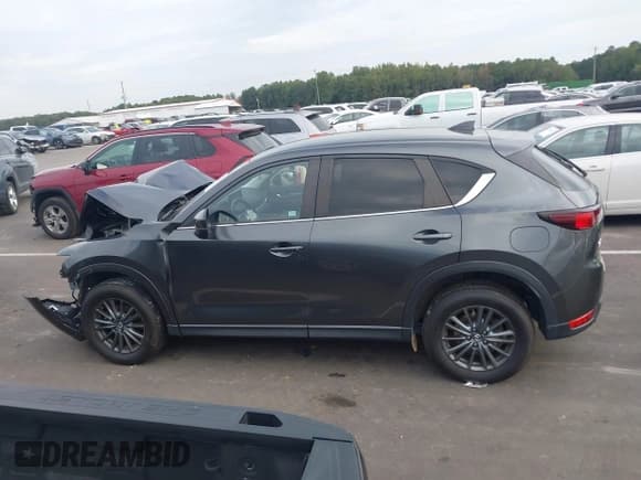 ✅ 2021 Mazda CX-5 Touring • VIN: JM3KFBCM7M0496218 • Lot: 43322405. Wystawiony na IAAI z przebiegiem 61 558 mil. Bezpłatny archiwum sprzedaży aukcyjnych z USA i szczegółowy raport historii pojazdu na DreamBid. Zdjęcie 14.