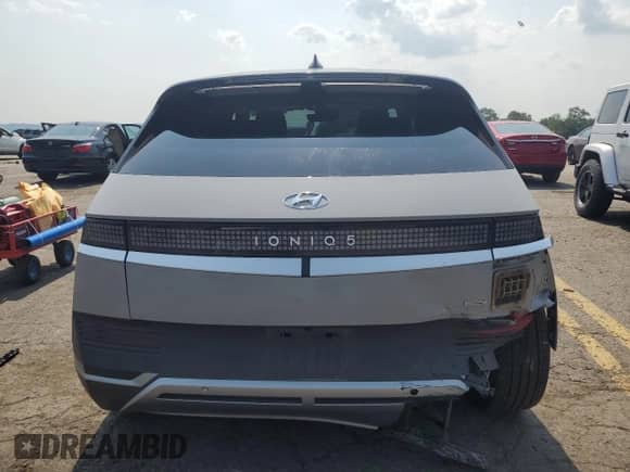 2022 Hyundai Ioniq 5 SEL z VIN KM8KNDAF0NU050090, wystawiony jako Copart lot #63277554 z przebiegiem 14 423 mil mil oraz Szkoda całkowita • Salvage title. Historia ofert i sprzedaży dostępna na DreamBid. Obrazek 6.