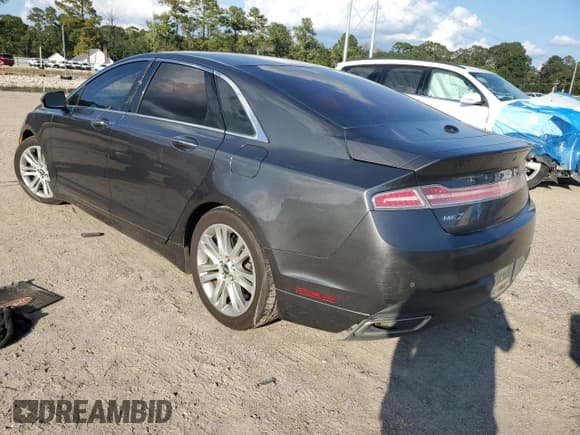 ✅ 2016 Lincoln MKZ • VIN: 3LN6L2GK0GR630059 • Лот: 85168085. Опубликован ранее на Copart с пробегом 165 334 миль. Бесплатный доступ к архиву аукционных продаж из США и подробный отчёт об истории автомобиля на DreamBid. Изображение 2.