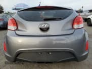 ✅ 2014 Hyundai Veloster • VIN: KMHTC6AD2EU217571 • Lot: 84044224. Listed on Copart with 137,609 mi. Free auction sales archive from the USA and detailed vehicle history report at DreamBid. Image 6.