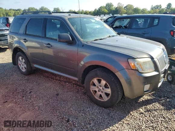 ✅ 2010 Mercury Mariner • VIN: 4M2CN9BG0AKJ07403 • Lot: 80071025. Listed on Copart with 128,074 mi. Free auction sales archive from the USA and detailed vehicle history report at DreamBid. Image 4.