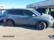 ✅ 2022 Honda Passport EX-L • VIN: 5FNYF7H57NB005716 • Lot: 41078499. Listed on IAAI with 33,141 mi. Free auction sales archive from the USA and detailed vehicle history report at DreamBid. Image 13.