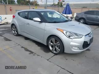 ✅ 2013 Hyundai Veloster w/Black Int • VIN: KMHTC6AD4DU092314 • Lot: 43757004. Listed on IAAI with 169,436 mi. Free auction sales archive from the USA and detailed vehicle history report at DreamBid. Image 1.
