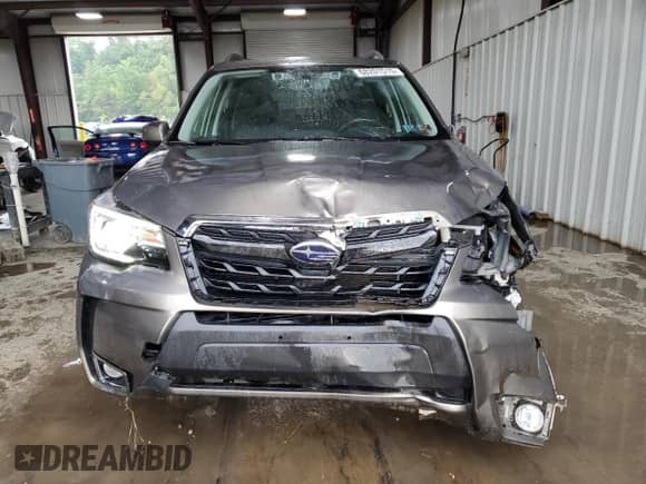 2018 Subaru Forester Touring с VIN JF2SJGWC8JH421727, выставлен на аукционе Copart как лот 68201515 с пробегом 84 424 миль миль и Списание • Salvage title. История ставок и продаж доступна на DreamBid. Изображение 5.